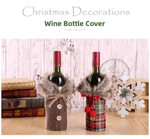 Detail of Christmas wine bottle covers with faux fur collars and festive plaid patterns