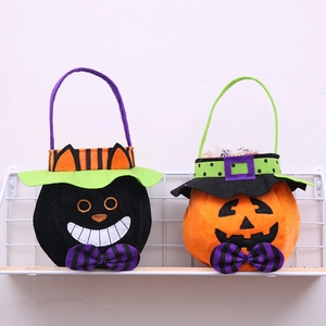 Halloween pumpkin and black cat felt treat bags with striped bows for kids party