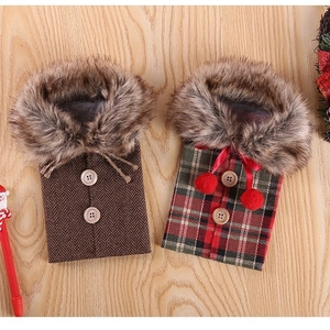 Christmas burlap and plaid wine bottle covers with faux fur collars and wooden buttons