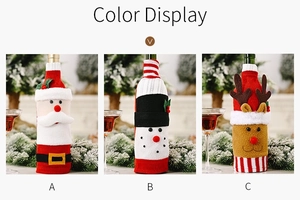 Detailed view of three knitted Christmas wine bottle covers featuring Santa, snowman, and reindeer