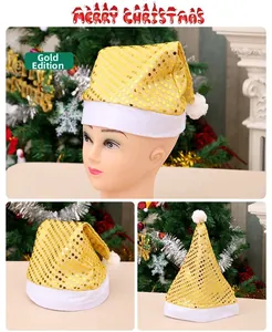 Detail of a golden sequined Christmas hat with white plush trim and fuzzy pom pom