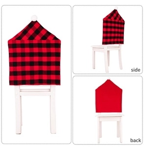 Three-way view of red and black buffalo plaid Christmas hat chair covers with white pom pom