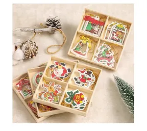 Detail of wooden Christmas ornaments set featuring reindeer and snowman in a wooden box