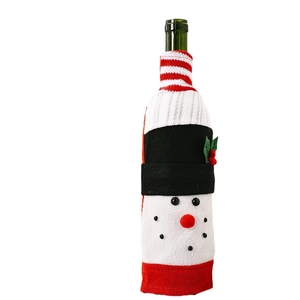 Festive snowman knit Christmas wine bottle cover with red stripes and plush texture