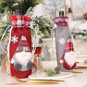 Christmas gnome wine bottle covers set in red and grey with snowflake decor and drawstring
