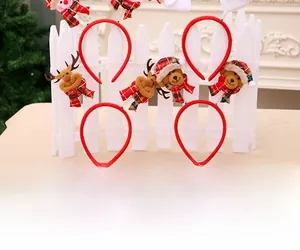 Detail showing Santa Claus, reindeer and snowman plush headband accessories for Christmas party