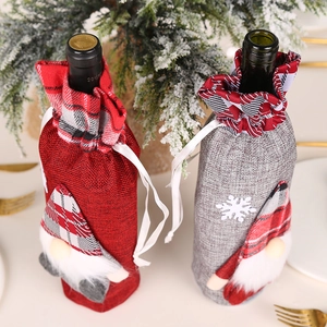 Christmas gnome wine bottle covers in red and grey felt for festive table decorations