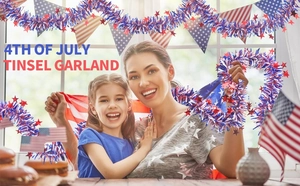 Detailed view of red white and blue July 4th tinsel garland with star ornaments