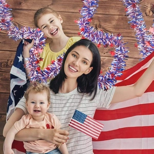 Detail of red white and blue tinsel garland with stars for Independence Day party decor