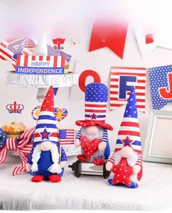 Three USA Independence Day gnomes with stars and stripes set on a festive table