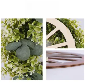 Détails des feuilles d'eucalyptus artificielles et du cadre en bois texturé du cercle