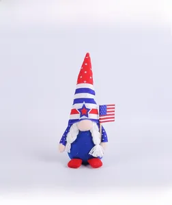 Close-up of patriotic US gnome ornament with stars stripes hat and small flag detail