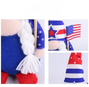 Detailed view of patriotic gnome with stars and stripes hat and small American flag