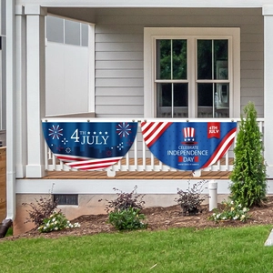 US Independence Day pleated fan flag hanging on a white porch railing for outdoor decor