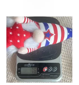 Weight measurement of Independence Day gnome plush showing approximately 76 grams