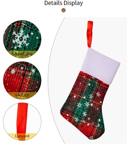 Detail view of plaid Christmas mini stockings with snowflake prints and hanging lanyards