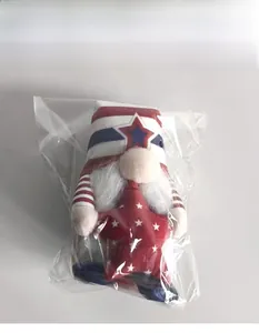 Detail of USA Independence Day gnome plush toy in transparent plastic bag packaging