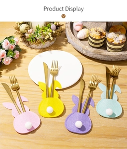 Easter felt bunny cutlery holders in four colors on a festive table with spring decor