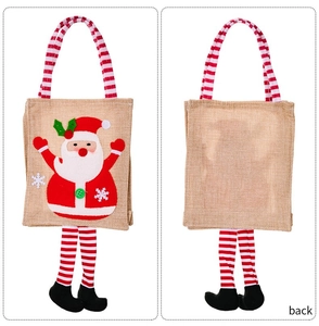 Detailed front and back view of Christmas burlap gift bag with Santa and striped legs