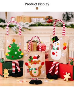 Three festive Christmas burlap bags with 3D reindeer and snowman on gift boxes