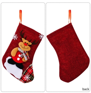 Detailed front and back view of red burlap Christmas stocking with a 3D reindeer design