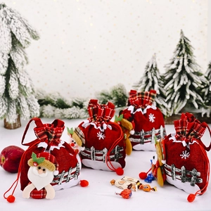 Christmas burlap drawstring gift bags featuring Santa, snowman, and reindeer designs