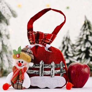 Christmas burlap gift bag featuring a 3D snowman doll with a red plaid scarf and top handle