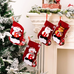 Set of 4 red burlap Christmas stockings with 3D Santa and Reindeer for holiday fireplace decor