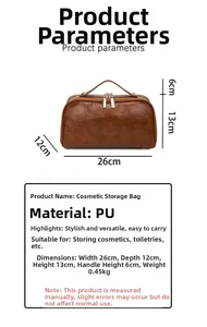Detail view of brown crocodile texture travel toiletry bag with dimensions 26cm x 13cm x 12cm