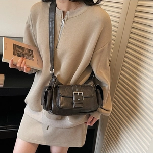 Retro distressed dark brown multi-pocket crossbody bag for women in 2026 spring style