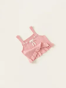 Canotta in maglia rosa per bambina con decorazione a fiocco e bordo a volant fini