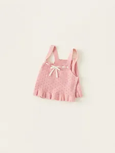 Gilet in maglia rosa per bambine con fiocco bianco e orlo a volant decorativo