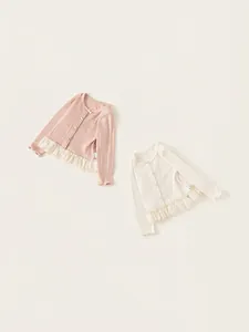 Sweet girls knitted cardigan with lace hem and colorful buttons in pink and beige