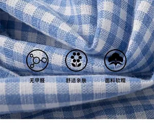 Close-up of blue and white plaid fabric texture for girls summer clothing set