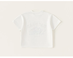 Detailed back view of a white cotton kids T-shirt with natural letter and mountain print
