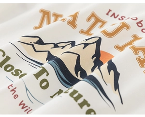 Detail of soft white cotton fabric with vintage outdoor nature print on kid's t-shirt