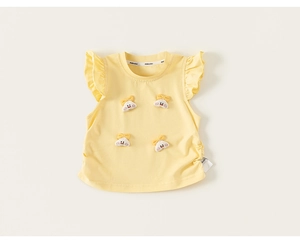 Detailed view of yellow toddler girl top with ruffle sleeves and cute cartoon cloud patches