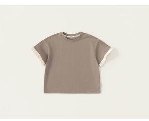 Detail of the brown cotton T-shirt featuring elegant off-white ruffled sleeve cuffs