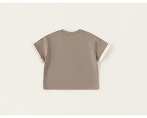 Detail of dark grey kids cotton t-shirt featuring stylish white lace trim on sleeve cuffs