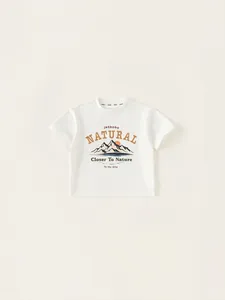 White cotton T-shirt for boys featuring outdoor mountain print and natural slogan