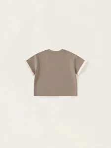 Kids cotton short sleeve T-shirt with ruffled lace cuffs in neutral tan color