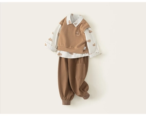 Flat lay of baby boy three-piece set featuring bear print shirt and khaki knit vest