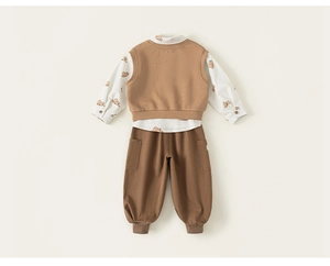 Detail view of boys three-piece suit with bear print shirt, vest and khaki trousers