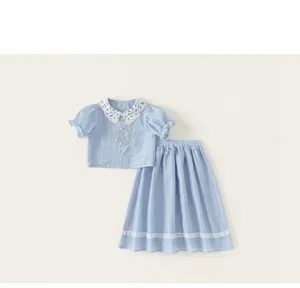 Detailed embroidery and lace collar on blue cotton linen two-piece girl summer set