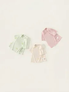 Dreierpack Baumwoll-T-Shirts für Mädchen mit Schleifenakzenten in Grün, Creme und Rosa