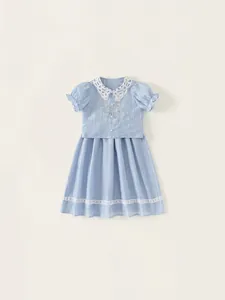 Girl's blue summer dress with lace collar and floral embroidery on textured fabric