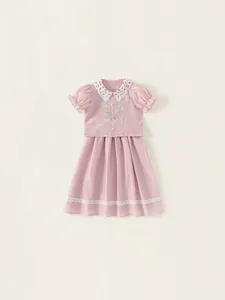 Pink girl dress with white lace collar, floral embroidery, and puff sleeves in summer