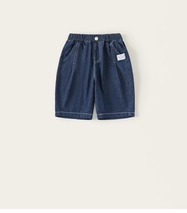 Close-up of kids dark blue denim shorts with elastic waist and white contrast stitching