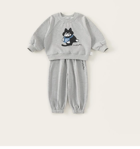 Close-up of light gray cotton sweatshirt featuring a cute cartoon cat with camera print