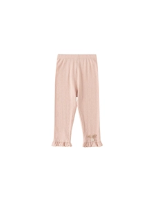 Toddler girl pink knit leggings with ruffle hem and pearl bow accents on a white backdrop